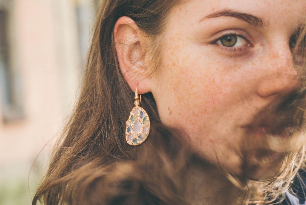 woman wearing a vintage earring