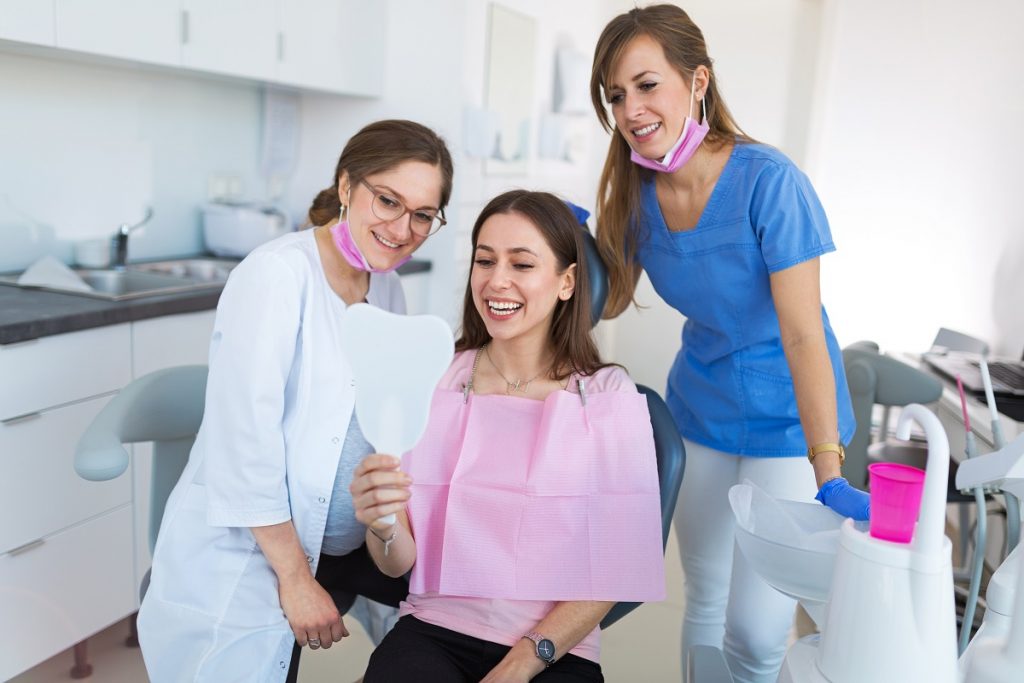 dentist, assistant and patient