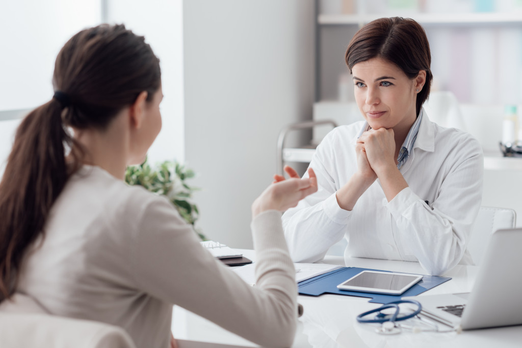 woman consulting a doctor