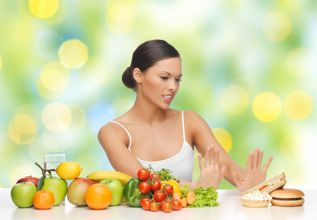 Recovered woman choosing healthy meals over cravings