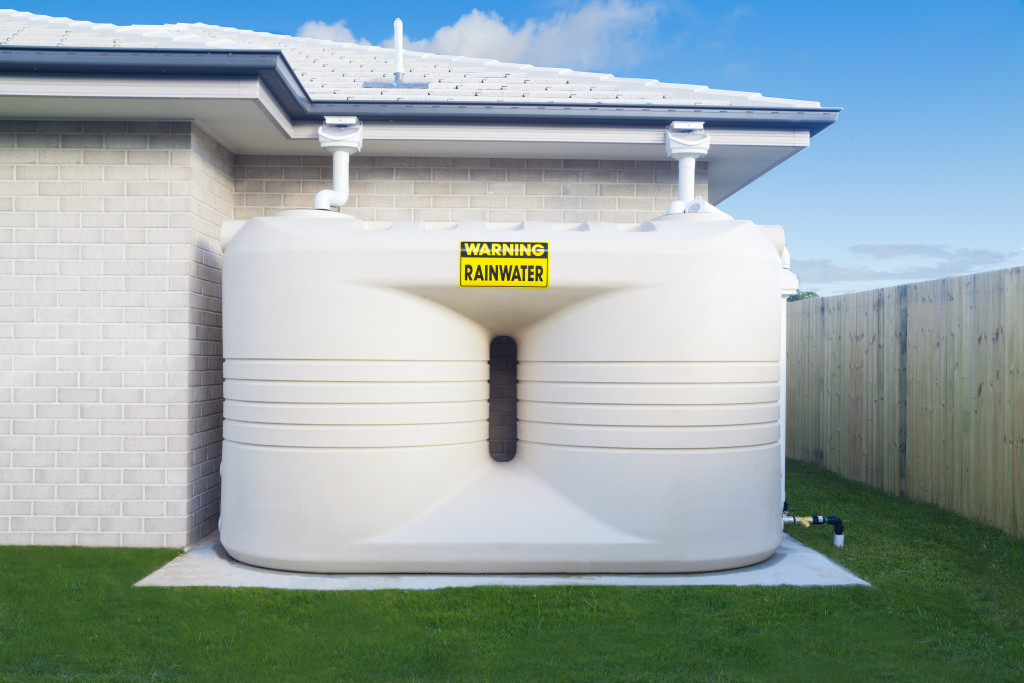 2 white rainwater tanks in a modern home