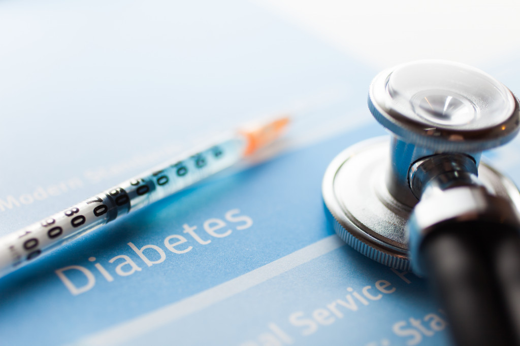 diabetes test with syringe and stethoscope