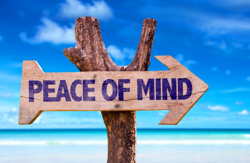 peace of mind road sign in beach