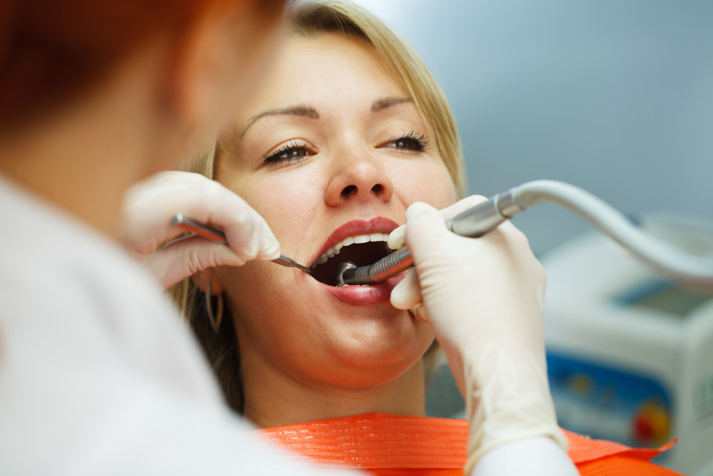 A woman having her teeth professionally cleaned