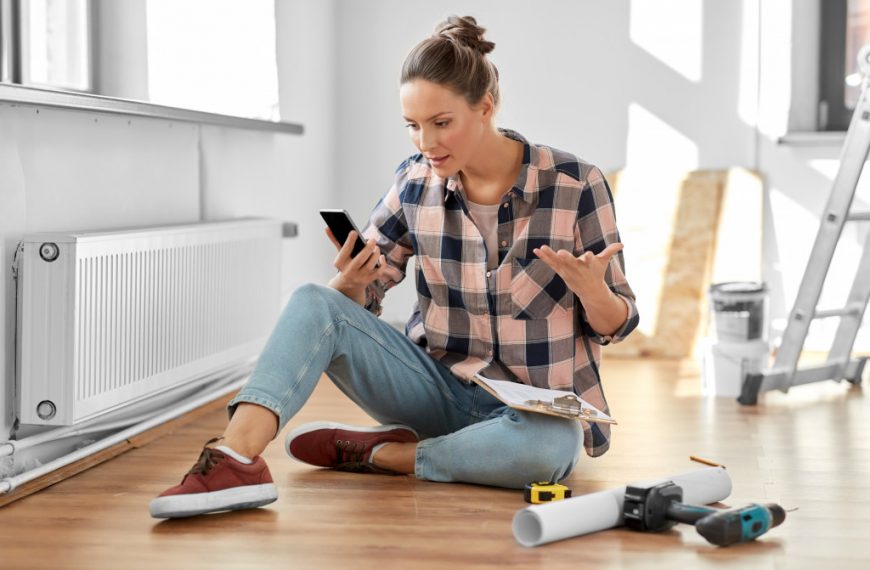 woman trying to tackle house repair