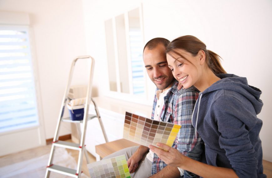 couple reviewing palettes with DIY materials at the back