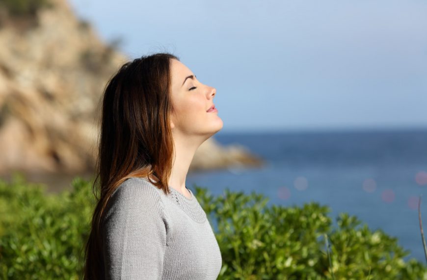 woman smiling in beach environment