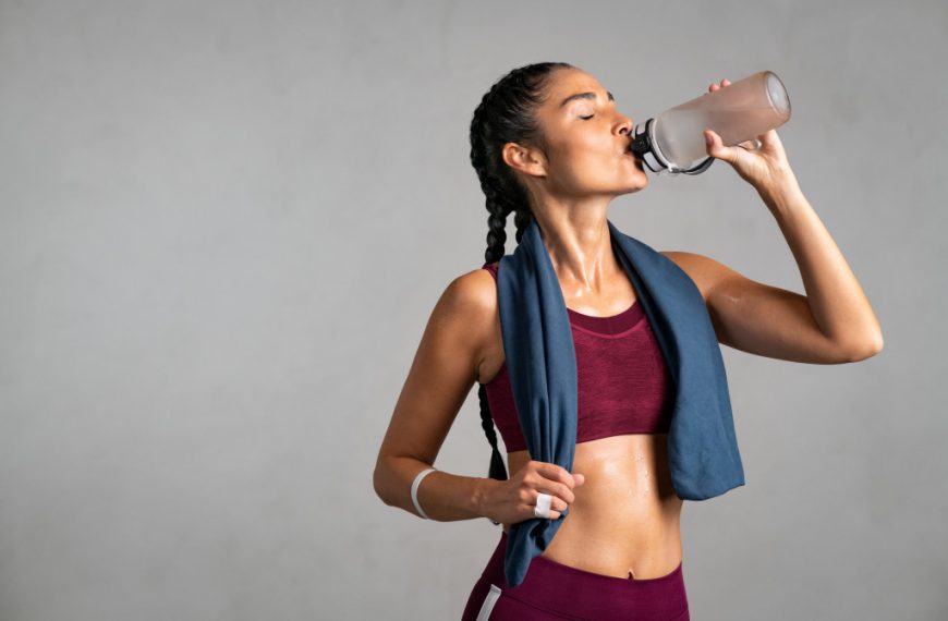 fitness woman drinking water